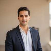 Professional LinkedIn headshot photograph, facing camera with direct gaze, well-fitted suit with shi